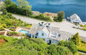 Amazing home in Skjoldastraumen with Outdoor swimming pool and 3 Bedrooms